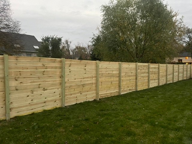 Custom wooden fence Custom wooden fence