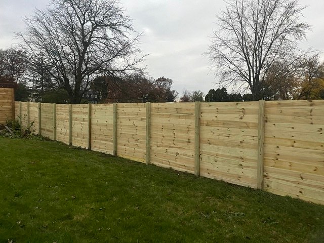 Custom wooden fence Custom wooden fence